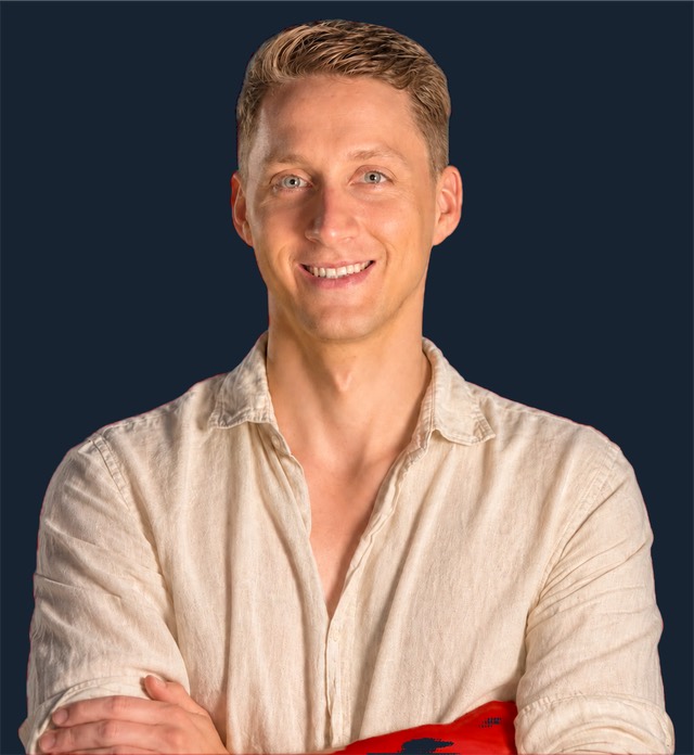 Mark Ambrus, smiling, arms crossed